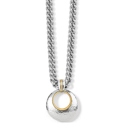 Brighton pendant necklace with hammered silver-tone circle, gold-tone ring accent, and curb chain on a white background