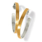 Brighton hoop earrings with two-tone finish featuring gold outer band and hammered silver-tone interior on a white background