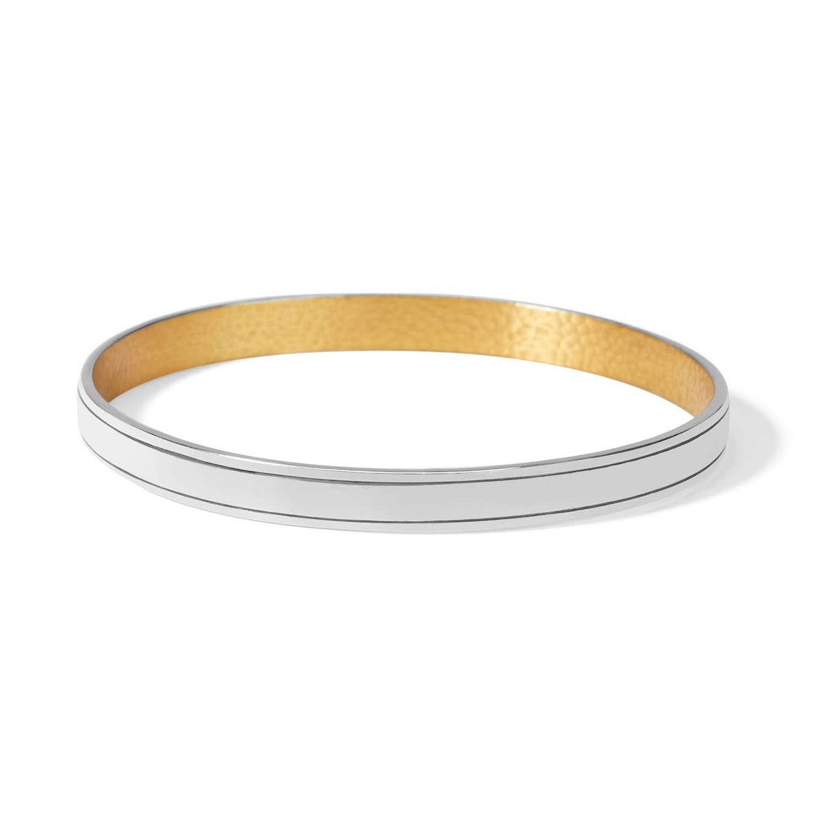 Brighton bangle bracelet with polished silver-tone exterior and warm gold-tone hammered interior on a white background