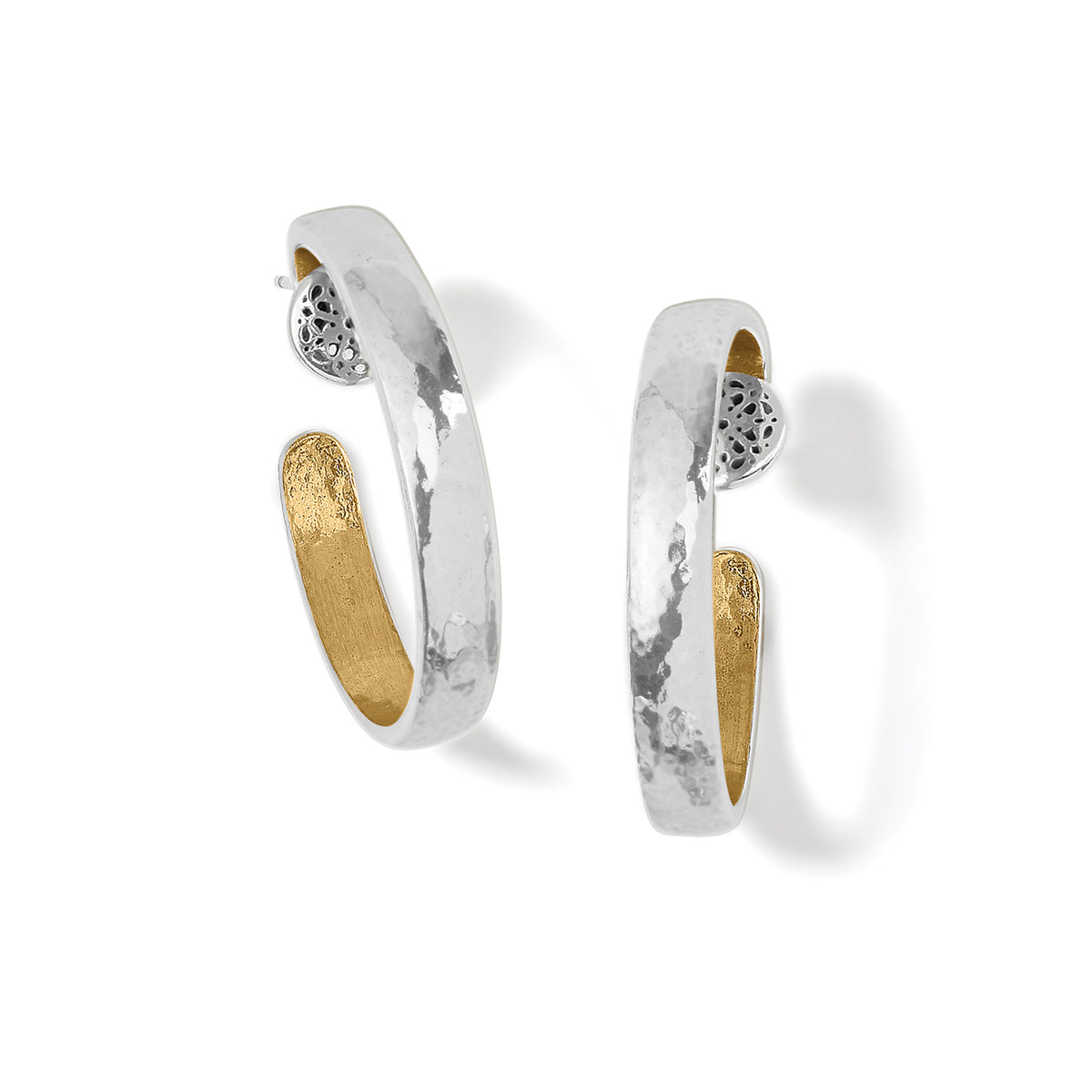 Brighton hoop earrings with hammered silver-tone exterior, gold-tone interior, and decorative filigree accents on a white background