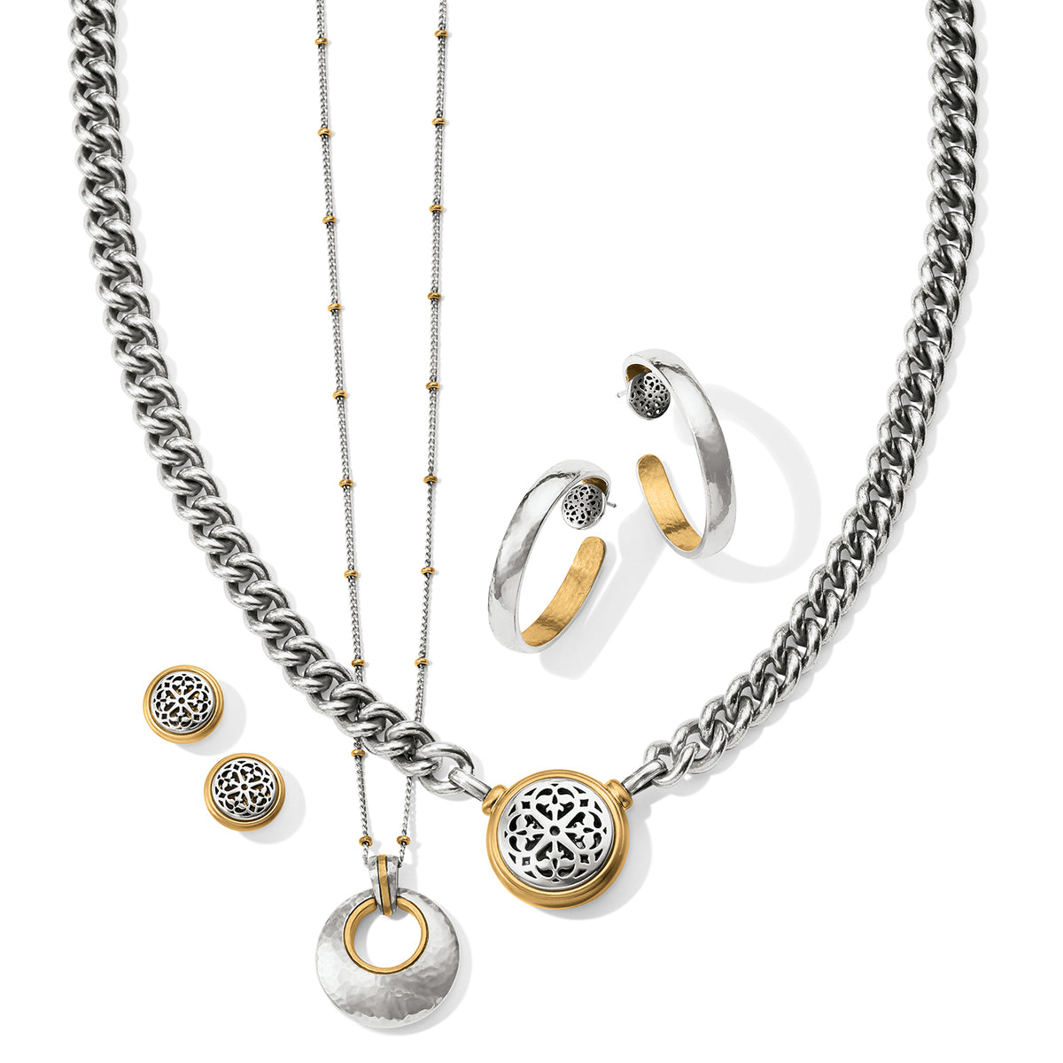 Brighton jewelry styled with two-tone necklaces, hoop earrings, and stud earrings featuring filigree medallion accents on a white background