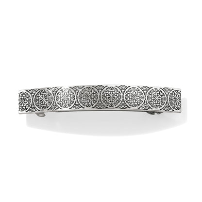 Brighton silver-plated hair barrette with row of ornate circular filigree medallion designs on a white background