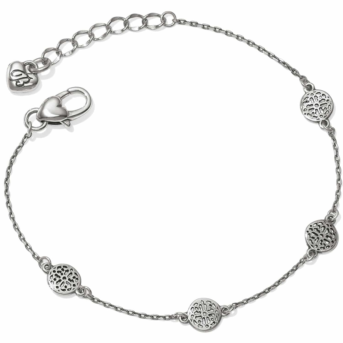 Brighton chain bracelet with three silver-plated openwork medallion stations, heart clasp, and extender chain on a white background