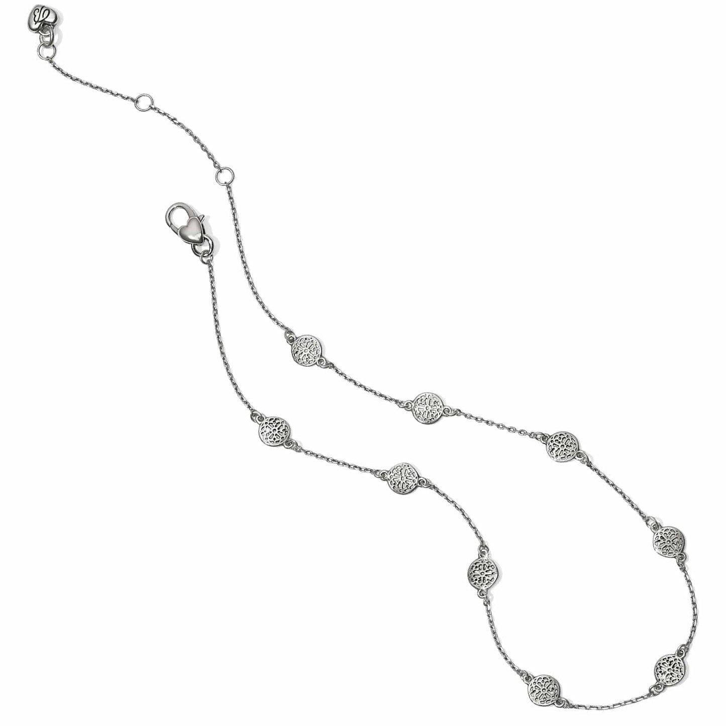 Brighton silver-plated station necklace with round openwork filigree medallions and lobster clasp on a white background