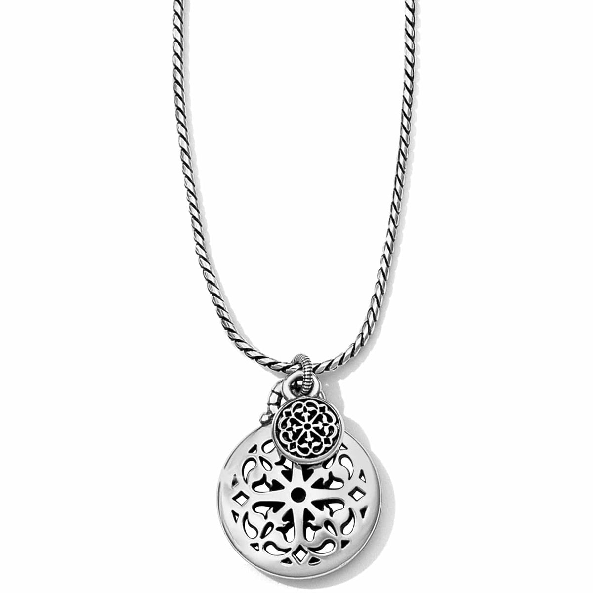 Brighton pendant necklace with silver-plated openwork medallion, small filigree charm, and rope chain on a white background
