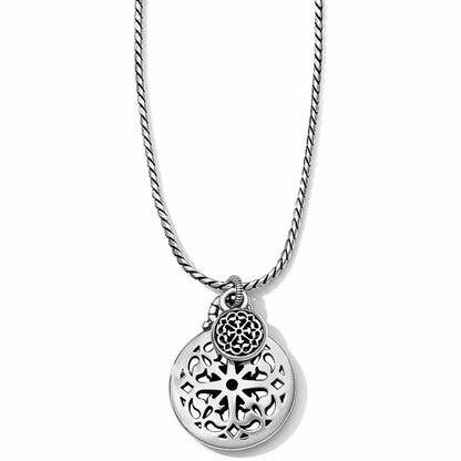 Brighton pendant necklace with silver-plated openwork medallion, small filigree charm, and rope chain on a white background
