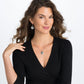 Model wearing a Brighton silver-plated pendant necklace with openwork disc paired with matching filigree drop earrings
