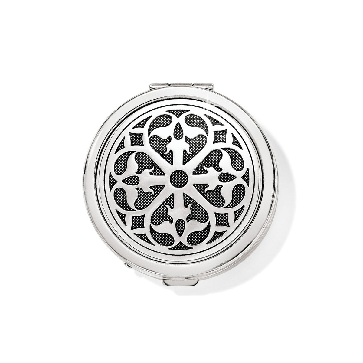 Brighton round compact with silver-tone ornate scrollwork medallion design and polished beveled edge on a white background