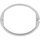 Brighton bangle bracelet shown from above with silver-plated finish and engraved scroll detailing on a white background