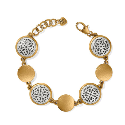 Brighton bracelet with brushed gold-plated hammered discs and silver-plated openwork medallions with lobster clasp on a white background