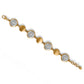 Brighton bracelet with brushed gold-plated hammered discs and silver-plated openwork medallions with lobster clasp on a white background