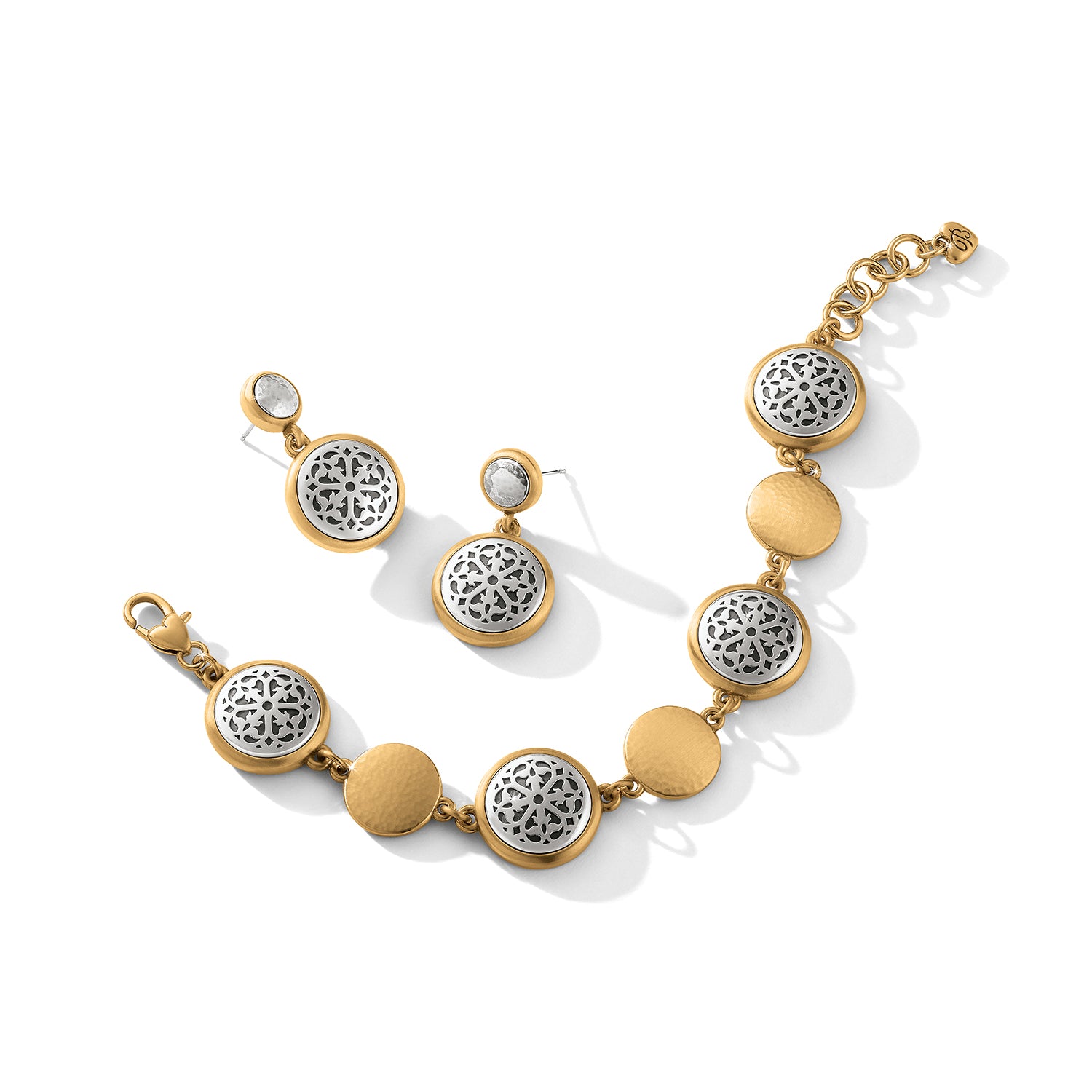 Brighton bracelet and drop earrings set with silver-plated filigree medallions, brushed gold-plated discs, and crystal accents on a white background