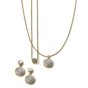 Brighton necklaces and earrings set with silver-plated filigree medallions and brushed gold-plated chains on a white background