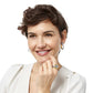 Model wearing a Brighton two-tone ring with round medallion detail paired with matching two-tone hoop earrings