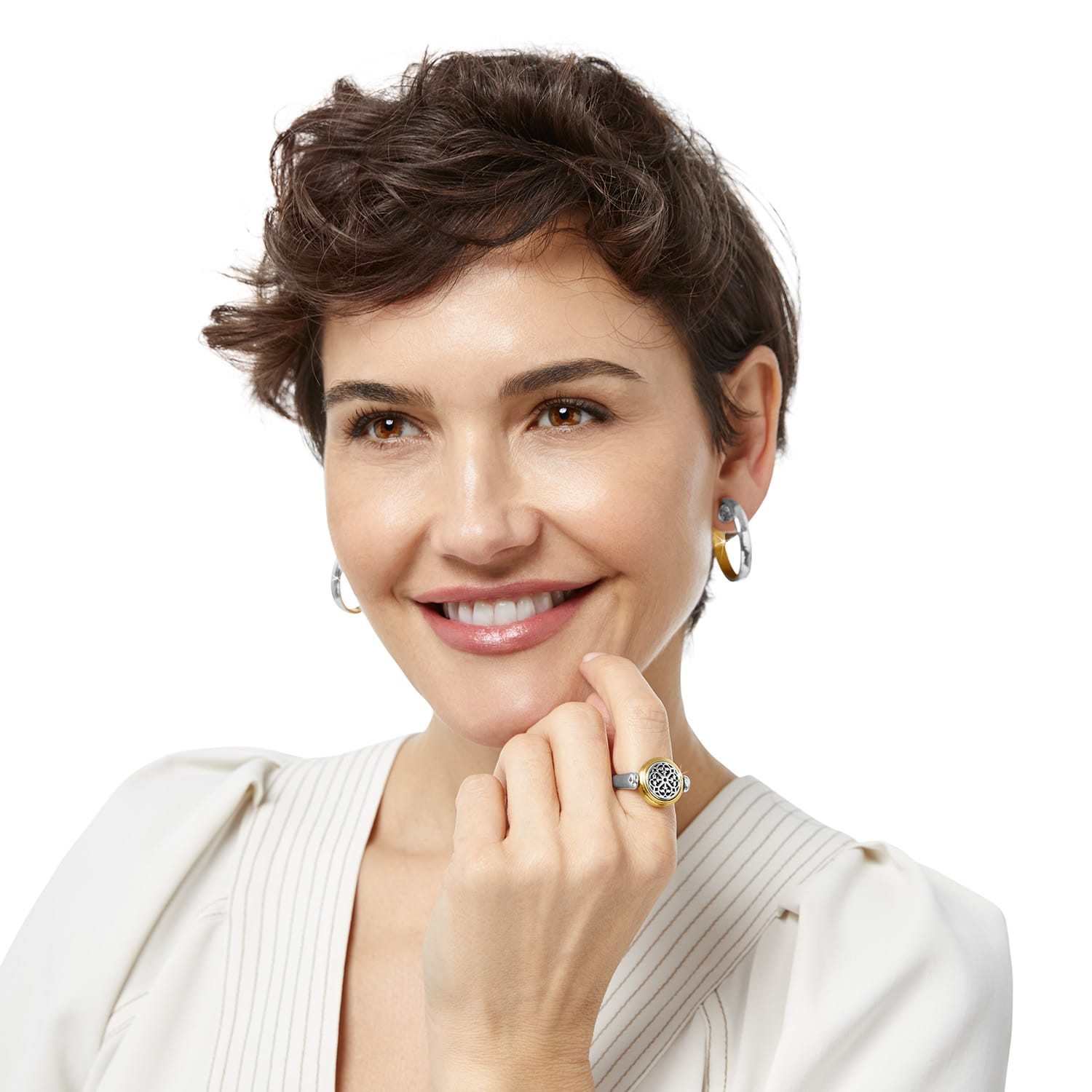 Model wearing a Brighton two-tone ring with round medallion detail paired with matching two-tone hoop earrings