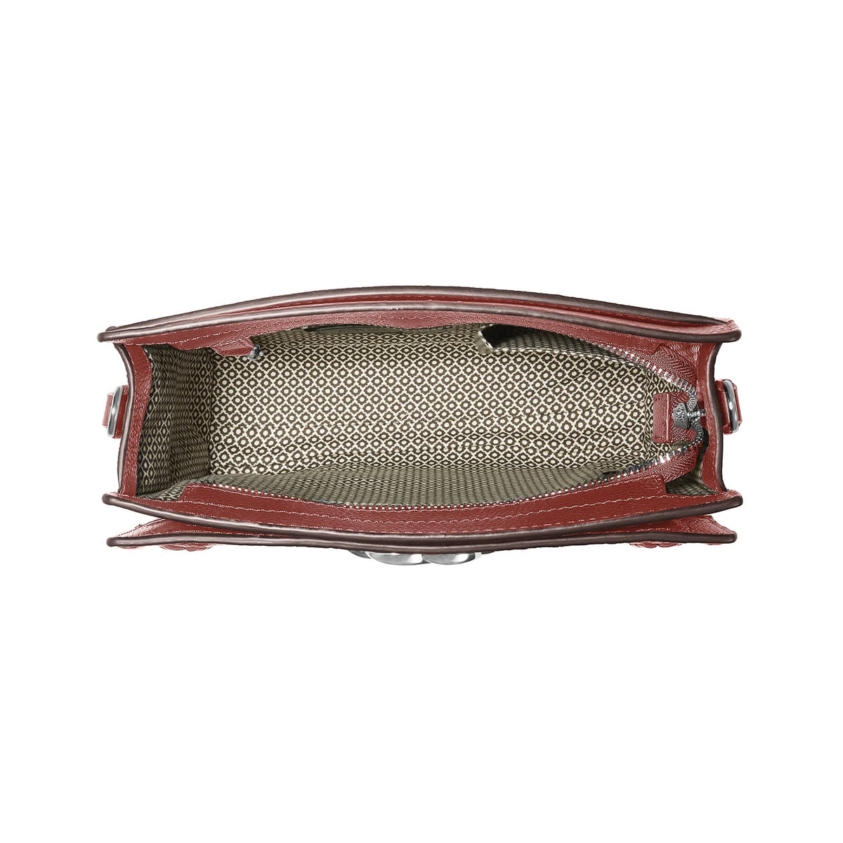 Brighton red leather handbag interior view showing patterned fabric lining and zipper closure on a white background