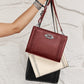 Brighton handbags in burgundy, ivory, and black leather with braided trim and silver-tone knot hardware