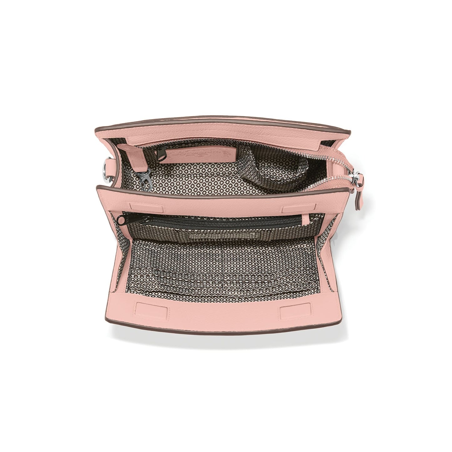 Brighton pink leather handbag shown open with patterned fabric interior lining and zippered pocket on a white background