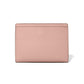 Brighton wallet shown from the back in pink pebbled leather with smooth top trim on a white background