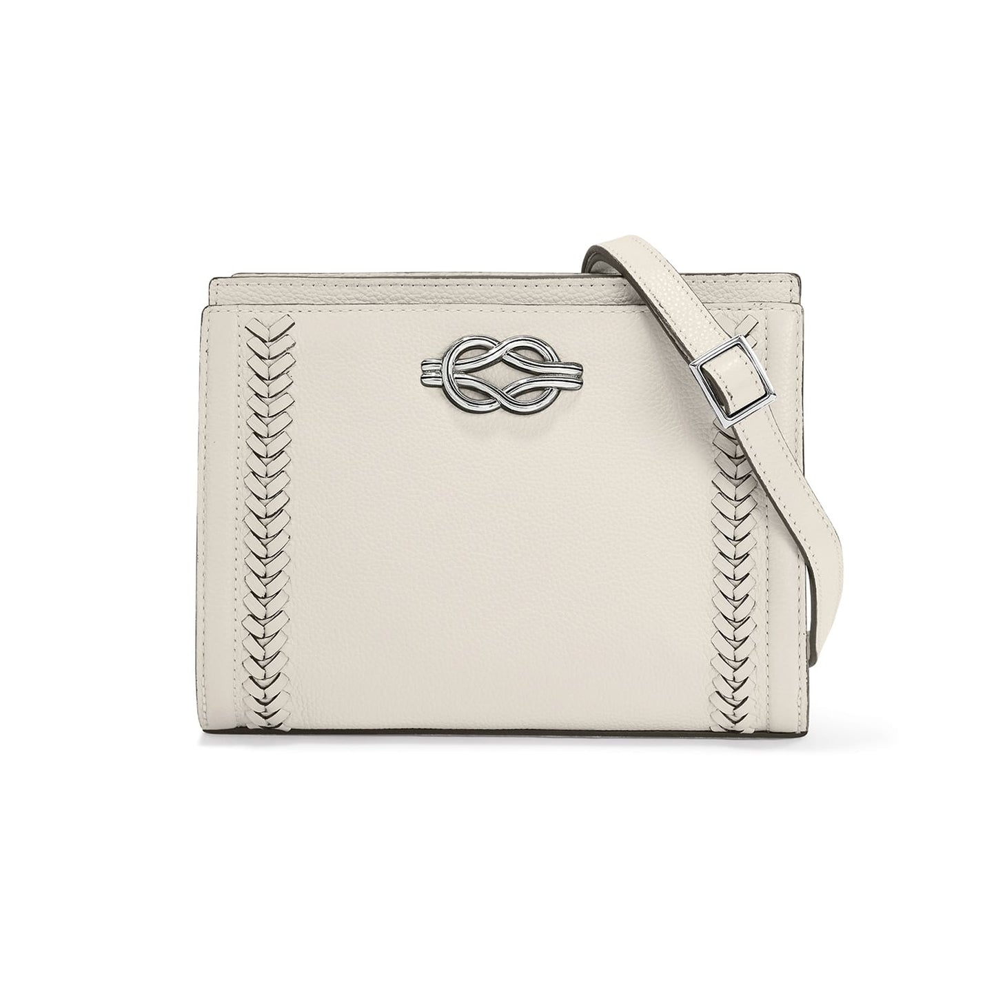 Brighton crossbody handbag in cream leather with braided side detail, silver-tone knot emblem, and adjustable strap on a white background