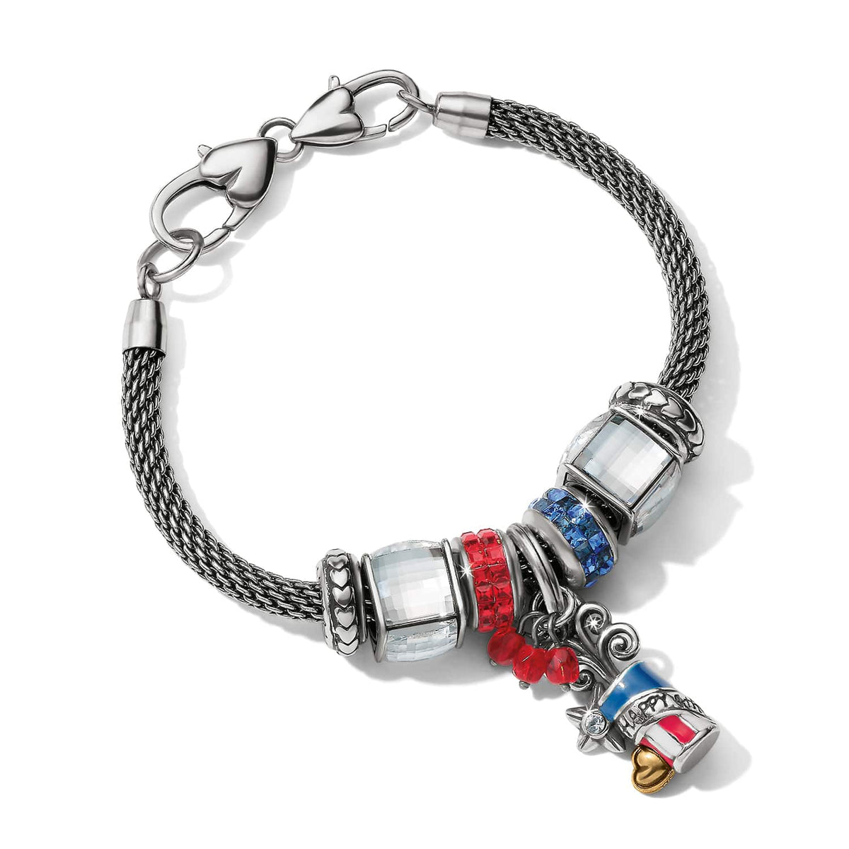 Brighton charm bracelet with clear, red, and blue crystal beads and enamel charm on a white background
