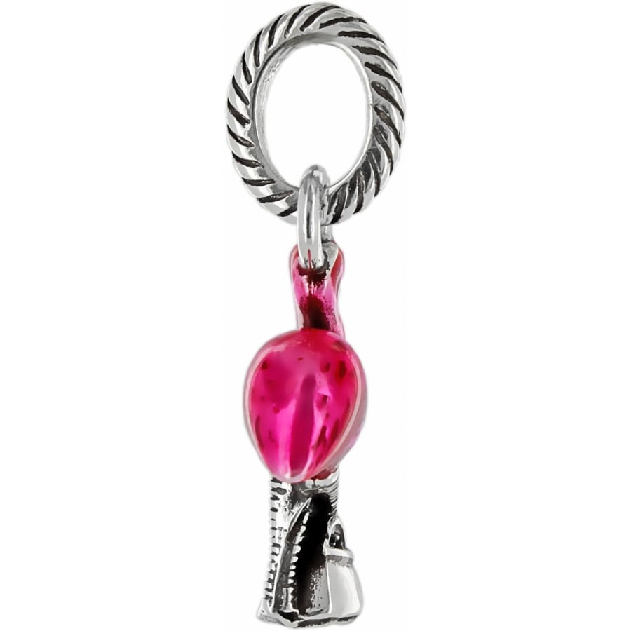 Brighton flamingo charm with pink enamel body and silver-tone legs hanging from a rope-textured ring on a white background