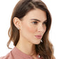 Model wearing Brighton silver-plated stud earrings with clustered crystal accents in a floral-inspired design
