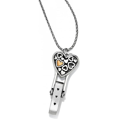 Brighton key pendant necklace with silver-plated heart charm and gold-plated heart accent on a white background