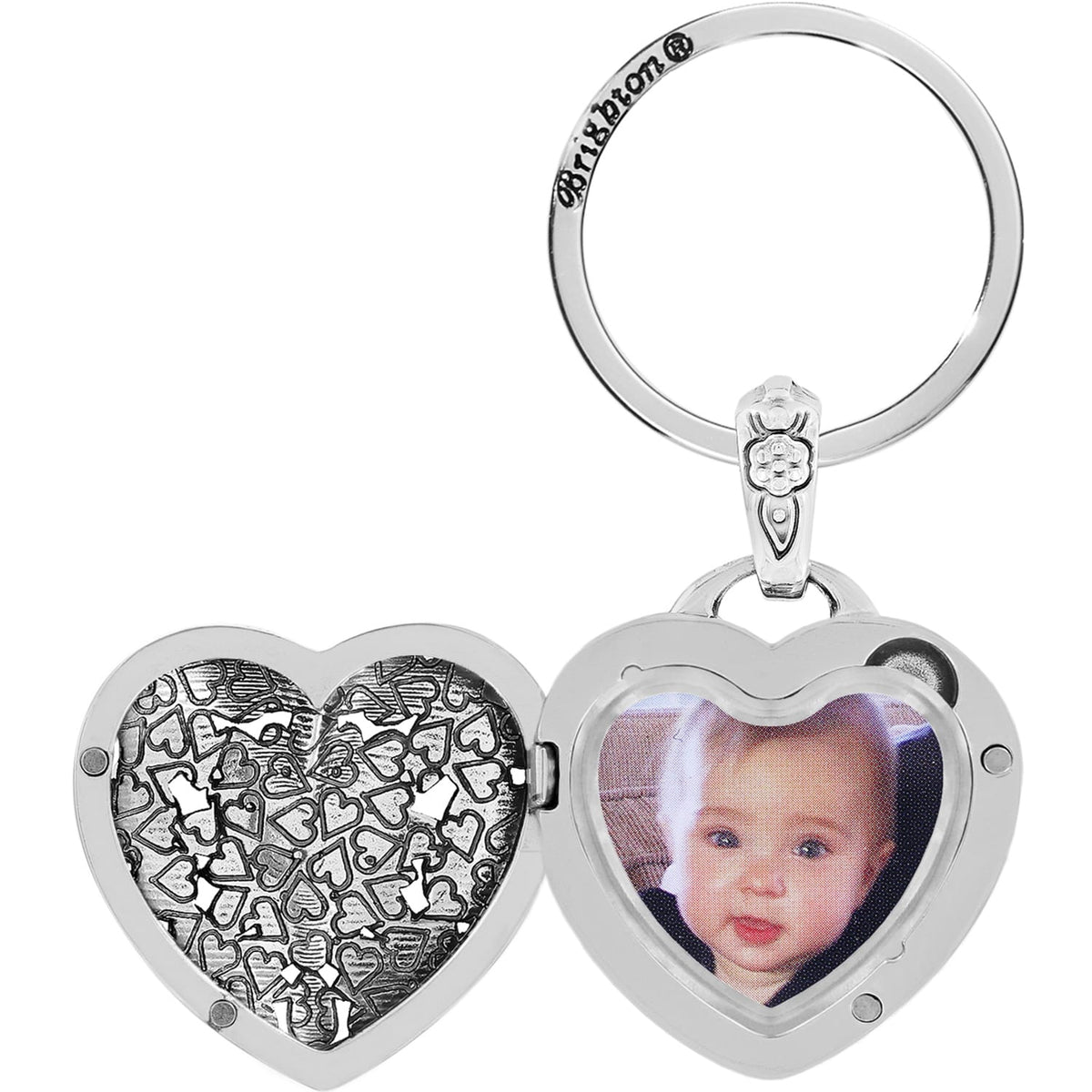 Brighton silver-plated heart locket key fob shown open with photo insert and embossed heart interior on a white background