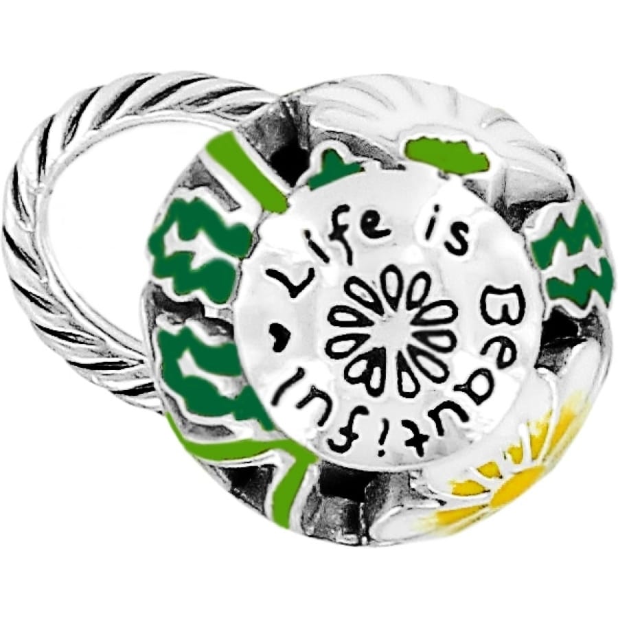 Brighton charm with silver-plated Life is Beautiful engraving, green leaves, and yellow daisy accents on a white background