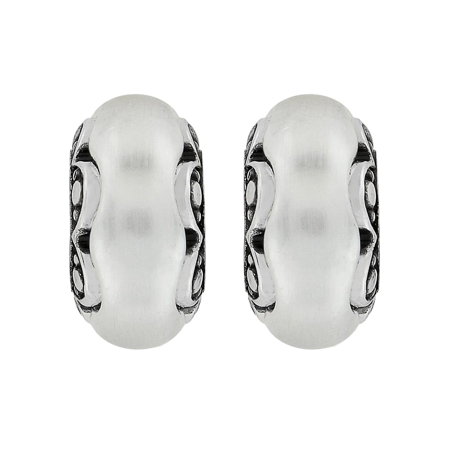 Brighton earrings with frosted white centers and silver-plated scrollwork side detailing on a white background