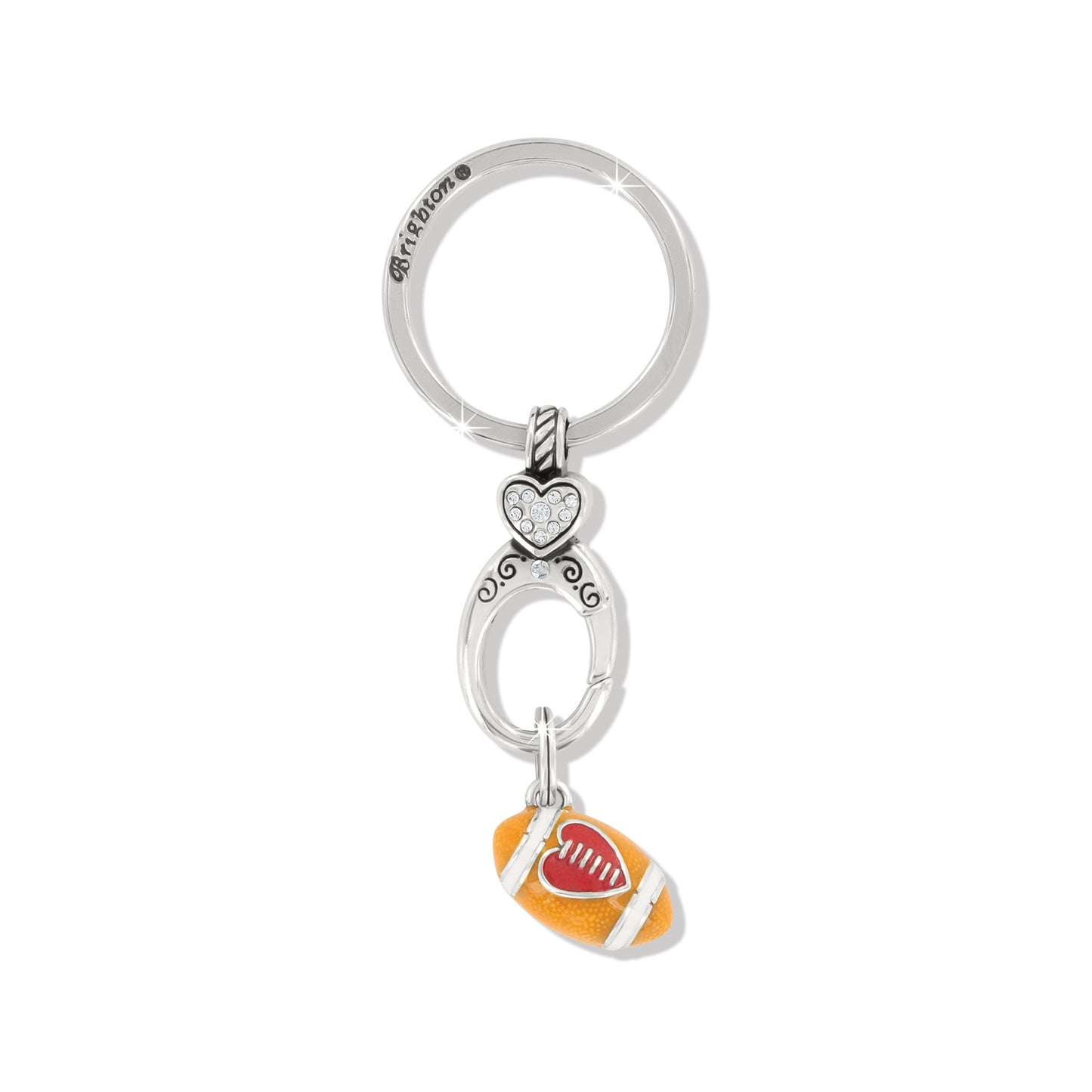 Brighton keychain with silver-plated heart crystal charm and orange enamel football pendant with red heart on a white background