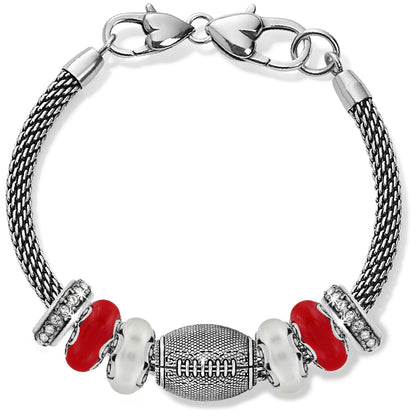 Brighton beaded bracelet with silver-plated football charm, red and white beads, and crystal spacers on a white background