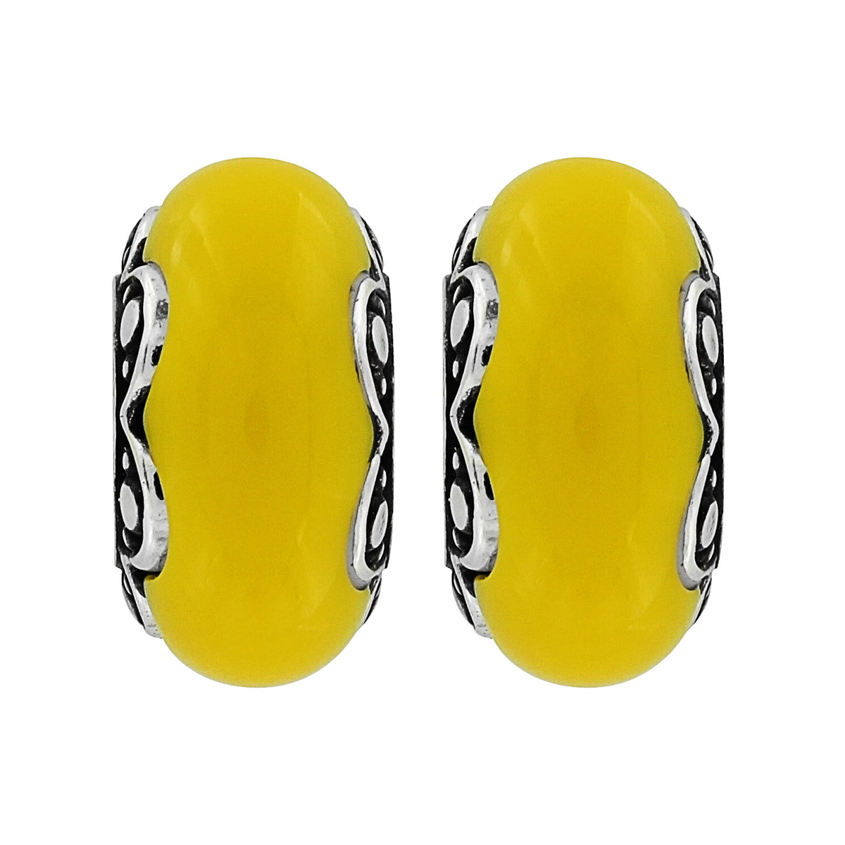 Brighton charm beads with yellow rounded centers and silver-plated scrollwork detailing along the edges on a white background