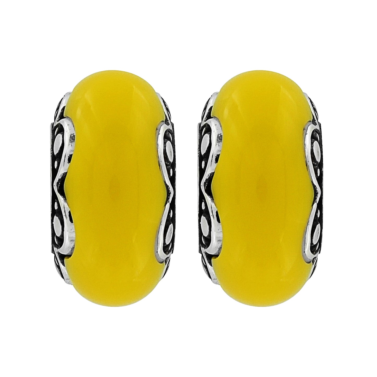 Brighton charm beads with yellow rounded centers and silver-plated scrollwork detailing along the edges on a white background