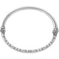Brighton bangle bracelet with two-tone finish and engraved scroll and dot detailing on a white background