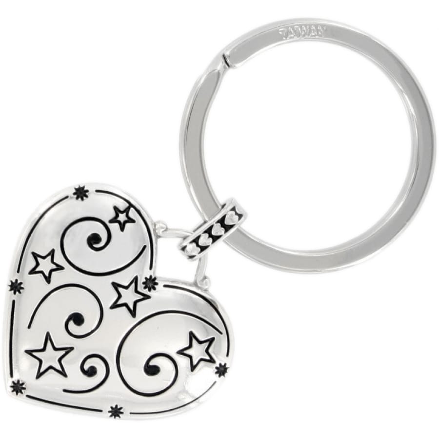 Brighton keychain with silver-plated heart charm featuring swirl and star engravings and split ring on a white background
