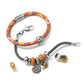 Brighton leather bracelet with orange floral print and silver-plated clasp, styled with charm bracelet and assorted beads