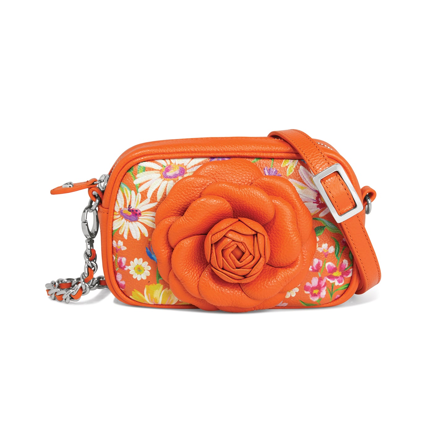 Brighton crossbody handbag in orange with floral print, dimensional rose appliqué, and adjustable strap on a white background