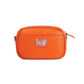 Brighton orange pebbled leather crossbody handbag with floral logo patch and silver-tone zipper on a white background