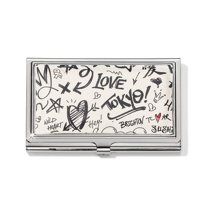 Brighton business card case with silver-tone frame and black graffiti-style print featuring hearts and text on a white background