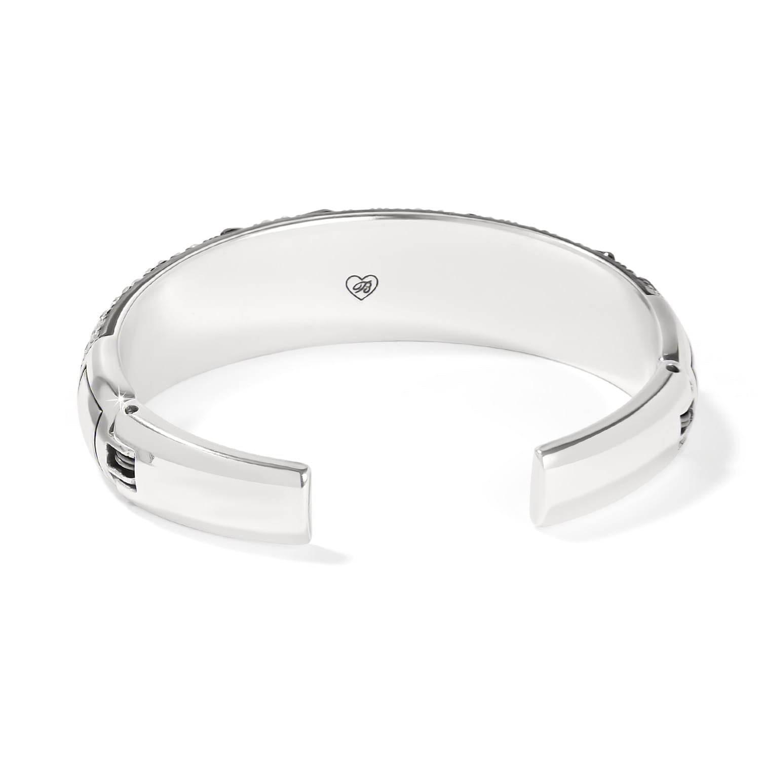 Brighton hinged cuff bracelet shown from the back with silver-plated finish and engraved heart logo on a white background
