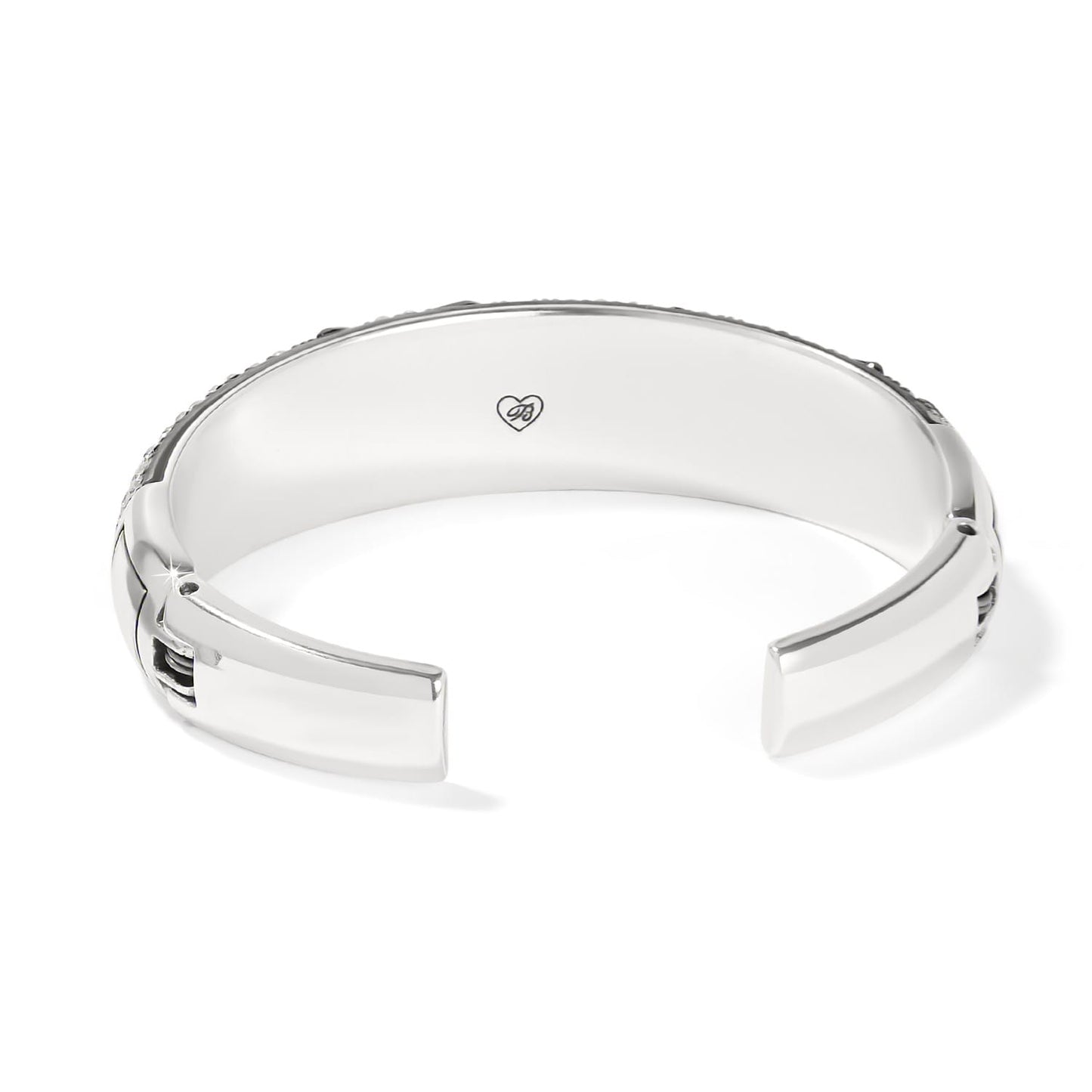 Brighton hinged cuff bracelet shown from the back with silver-plated finish and engraved heart logo on a white background