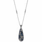 Brighton pendant necklace with silver-plated chain and teardrop pendant featuring blue and clear crystals on a white background