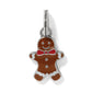 Brighton gingerbread man charm with brown enamel, red bow tie, and silver-plated accents on a white background