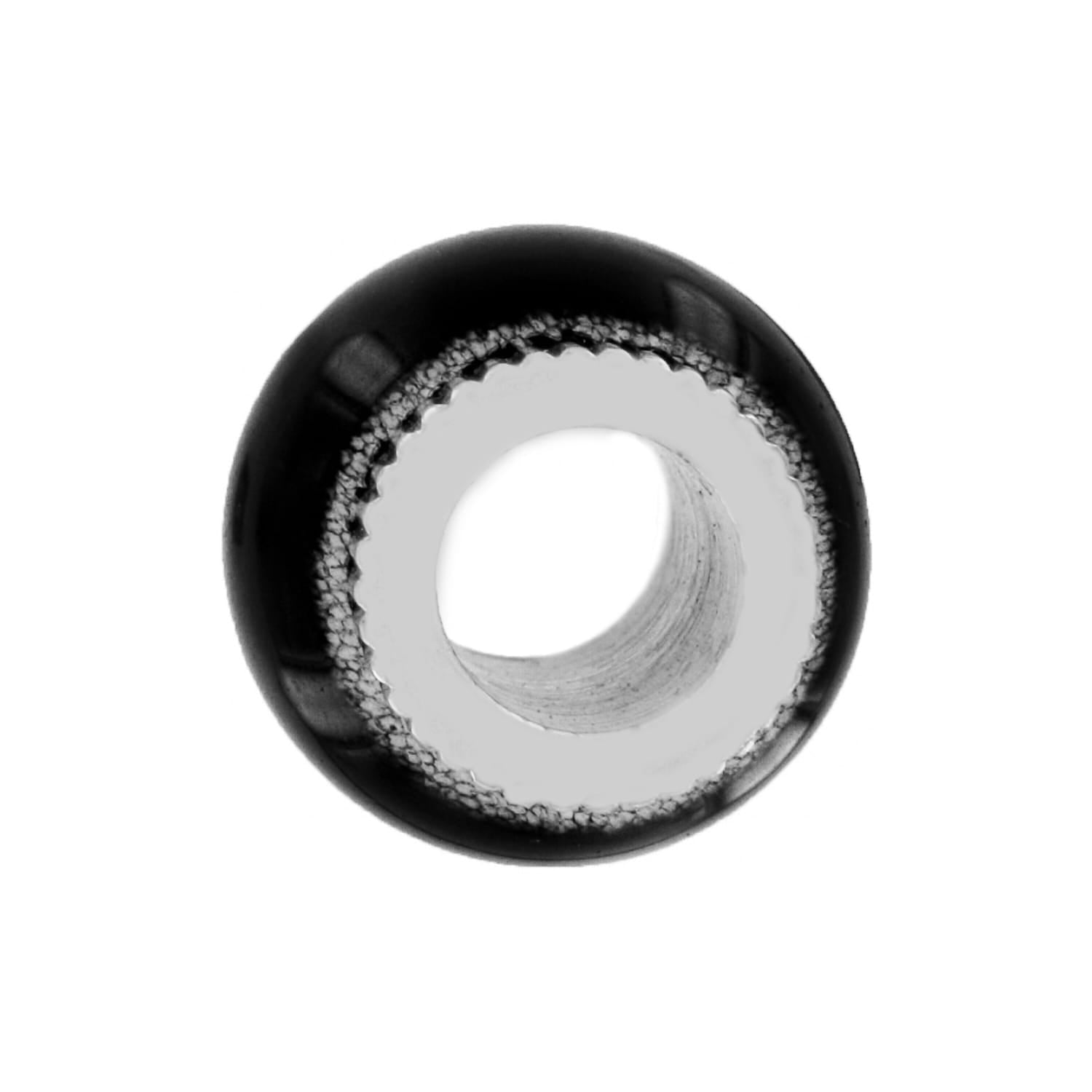 Brighton bead charm shown from the side with black exterior and silver-plated ridged interior on a white background