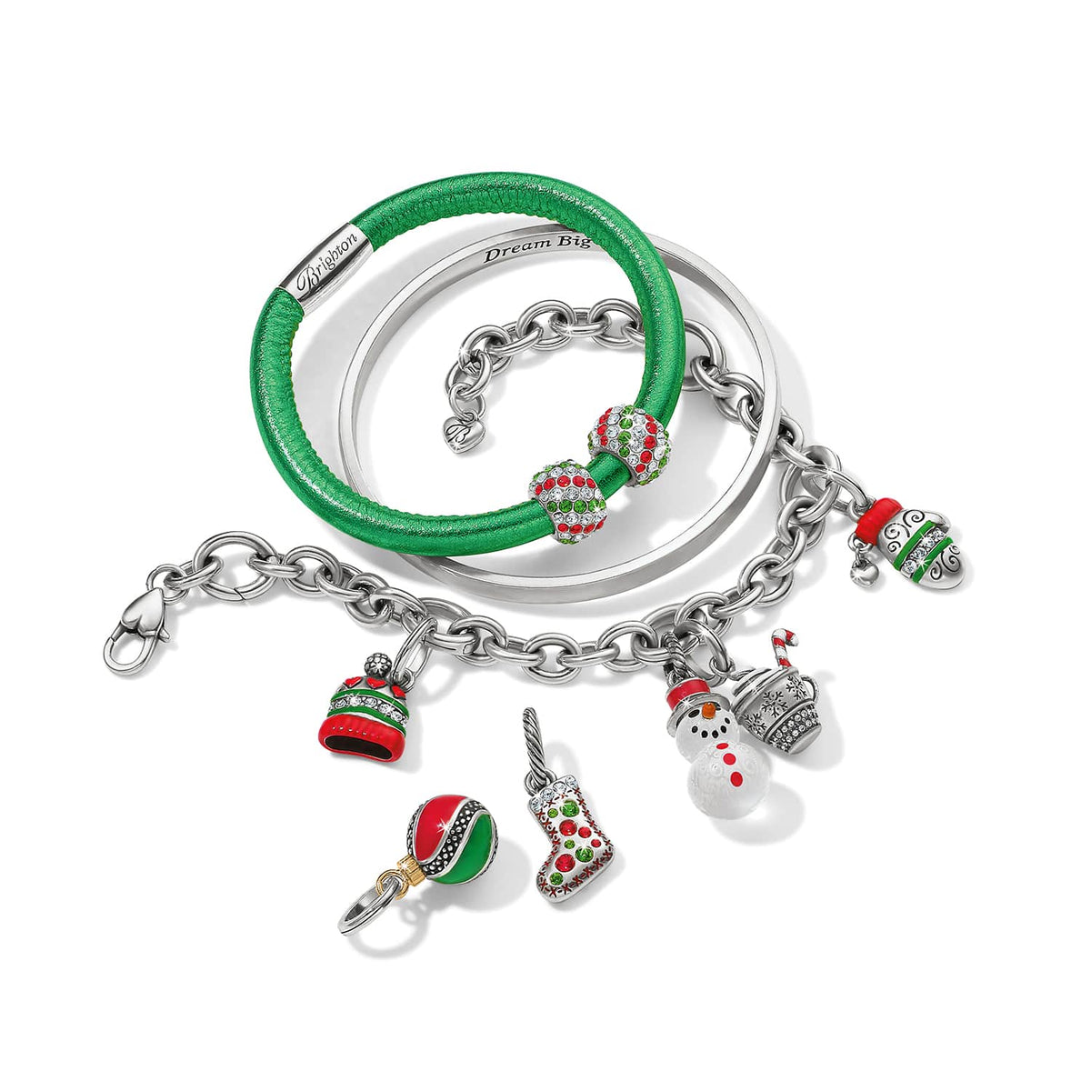 Brighton silver-plated charm bracelets styled with green leather bangle and holiday crystal charms on a white background