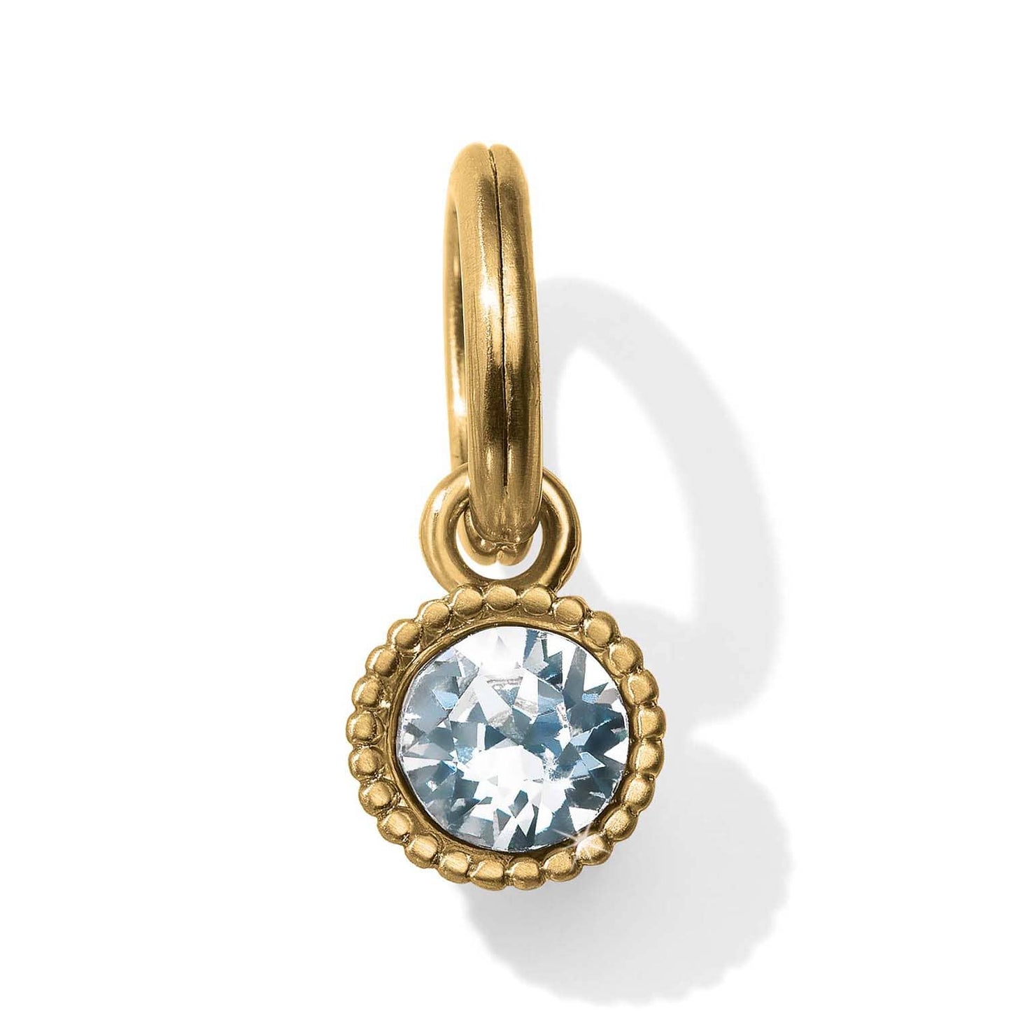 Brighton charm with round crystal stone in beaded gold-tone bezel and split ring on a white background