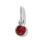 Brighton charm with round red crystal and silver-tone beaded border on a white background