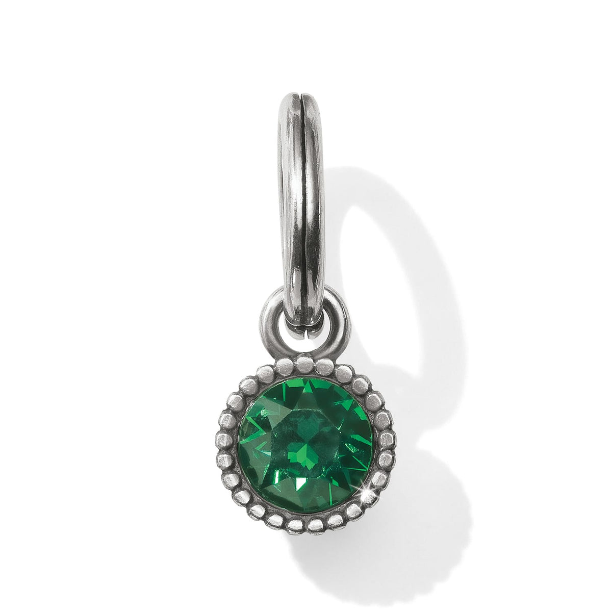 Brighton charm with round green crystal, beaded silver-tone frame, and split ring clasp on a white background